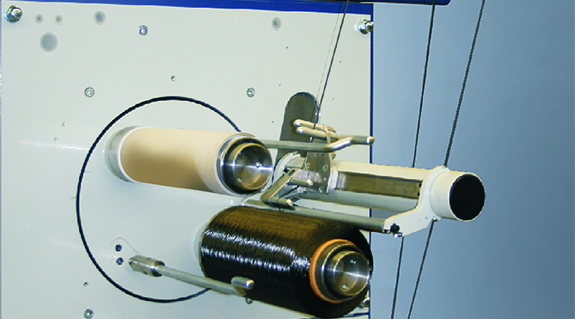 Winding machine for carbon fiber spools