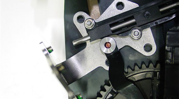 Lowering mechanism for hood ornament